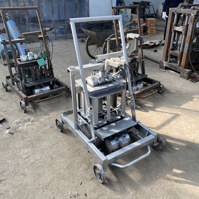 Простая в эксплуатации Ручная сцепление кирпичная машина Блок изготовление цемента машина